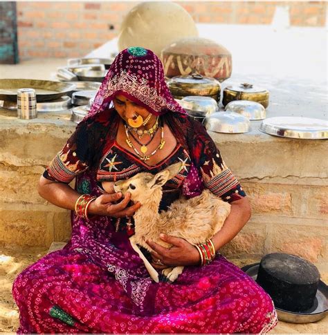 indian women breastfeeding deer